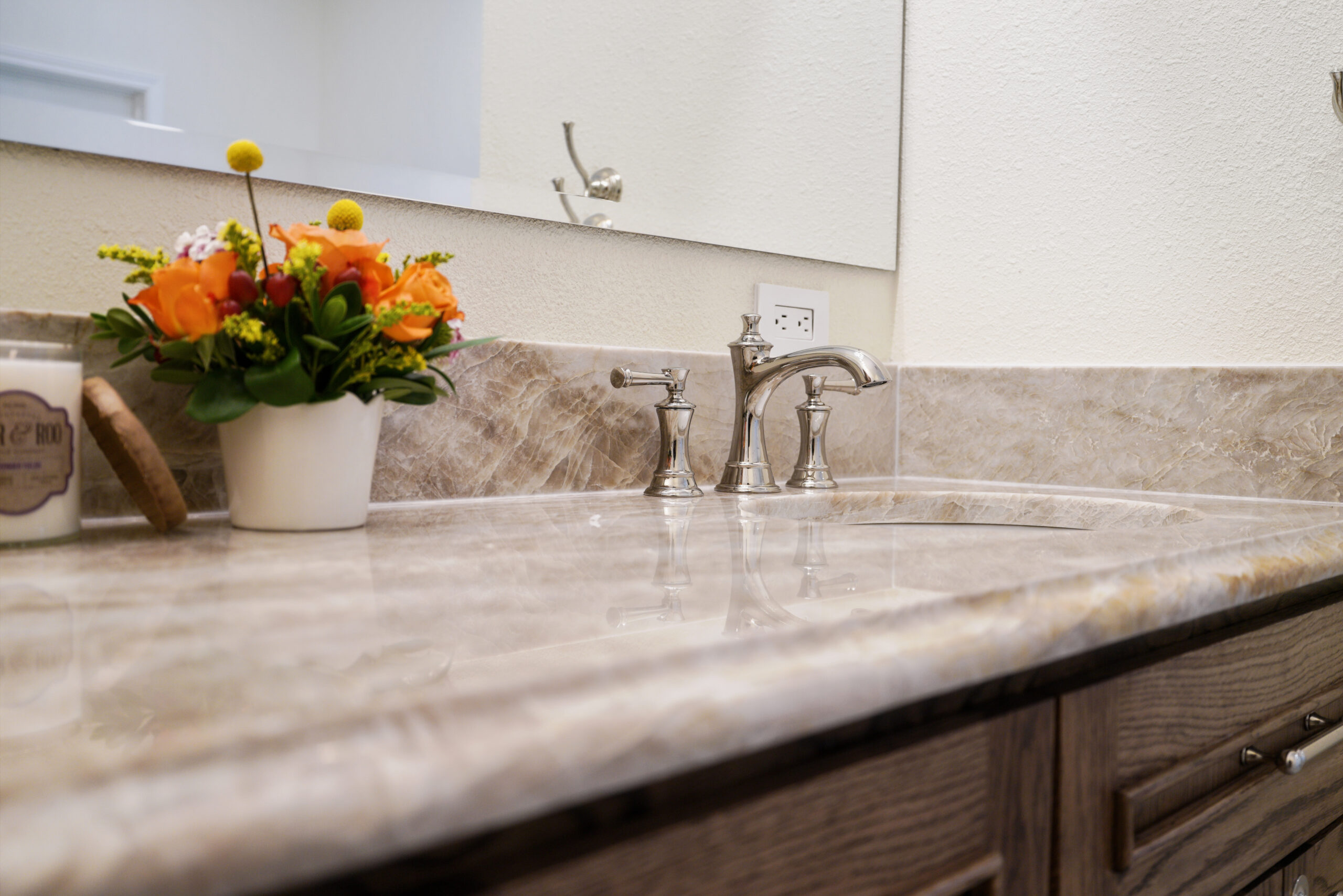 Custom bathroom remodel with Taj Mahal quartzite countertops in San Antonio, Texas