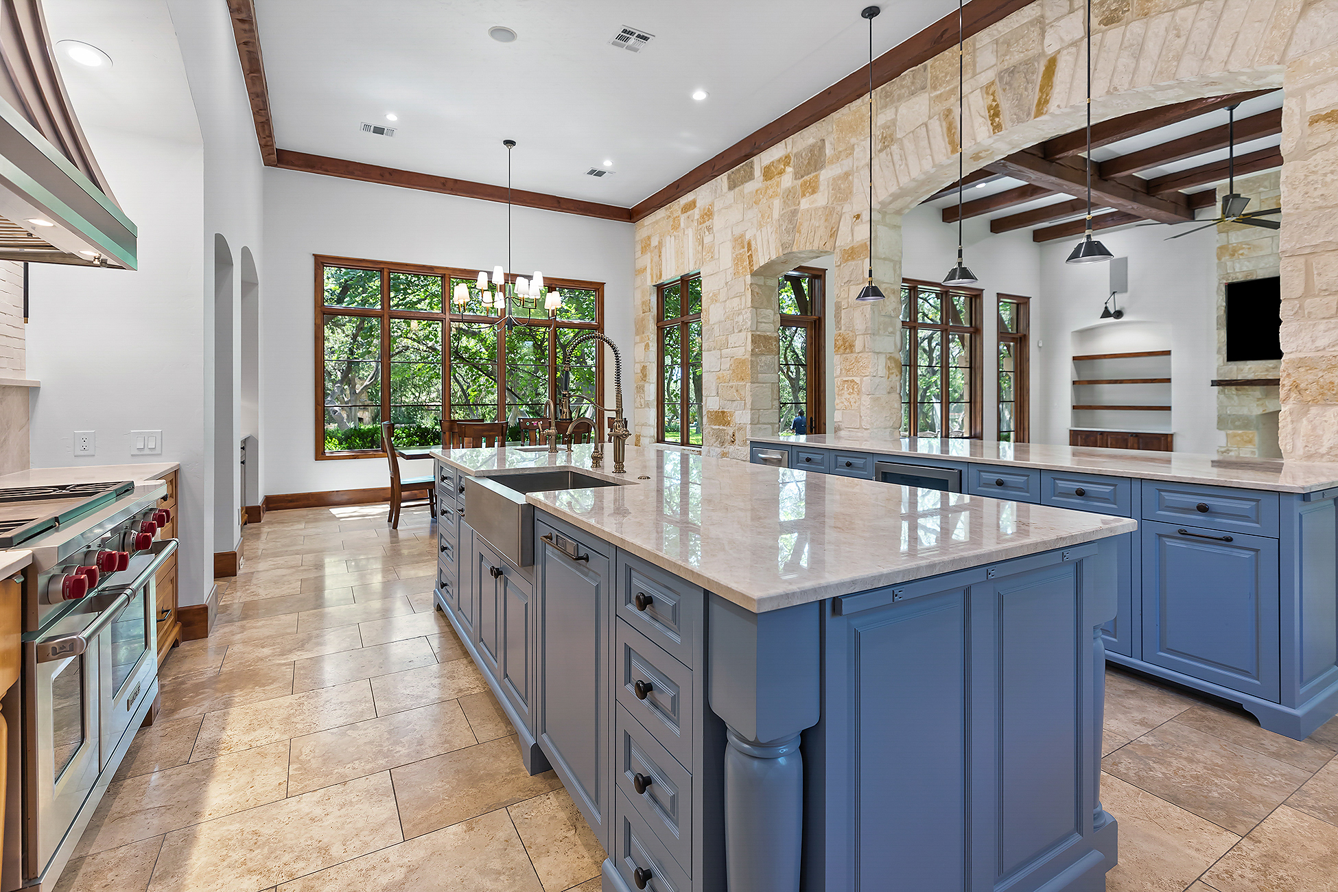 Custom kitchen with large island and built-in cabinetry in an Alamo Heights home