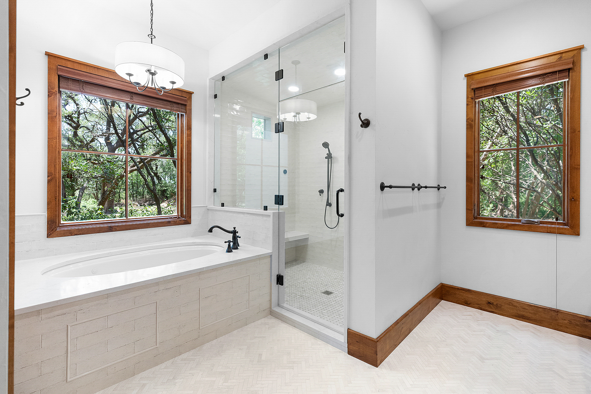 Spa-style primary bathroom with a walk-in shower and tub