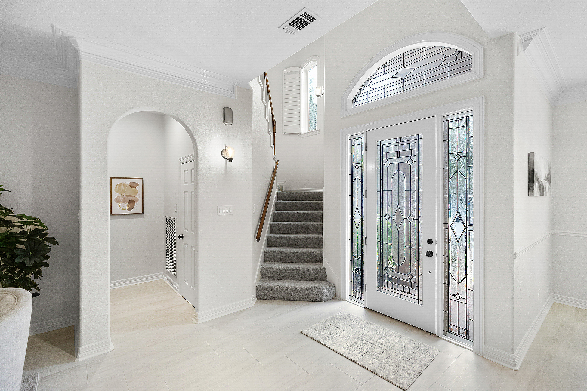 Open-concept living room with high ceilings in a newly built custom home